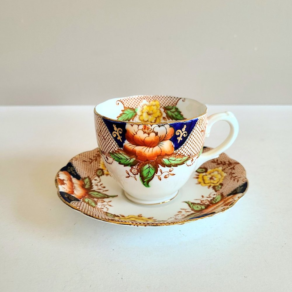 Vintage Fine Bone Bell China made in England Cup and Saucer with Floral design.